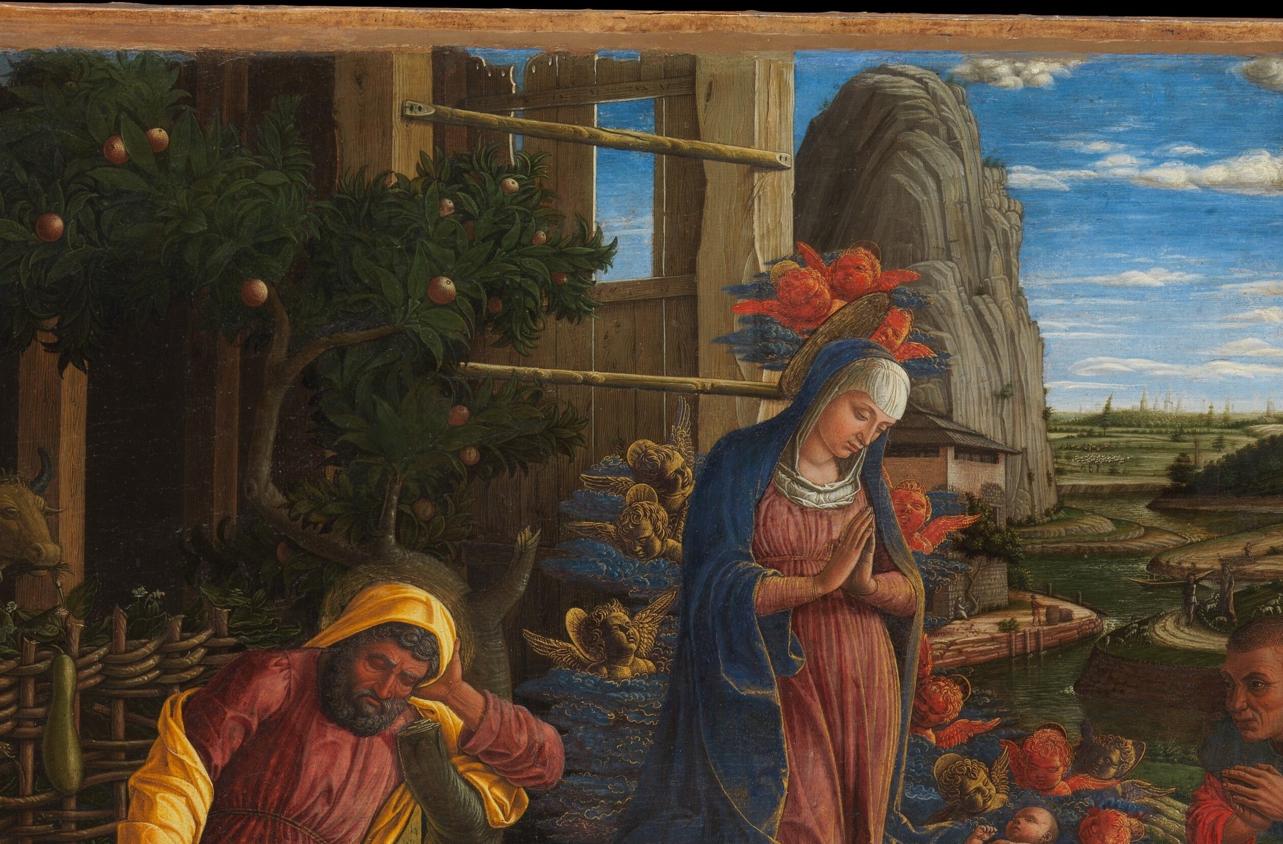Mantegna's signature geological formations , each rock layer painted with sculptural precision that suggests direct study of Paduan stone; this technique was radical for 1450 tempera