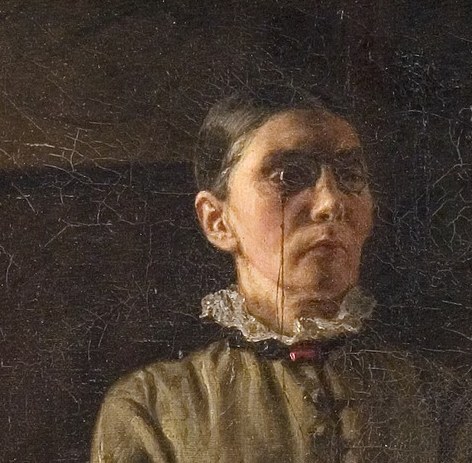 The teacher's calm gaze holds your attention.