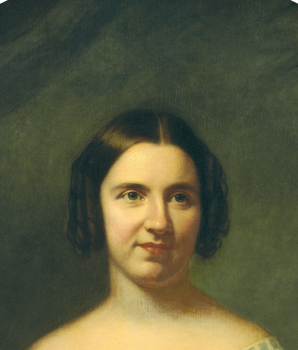 But her direct gaze holds a quiet, steely resolve.