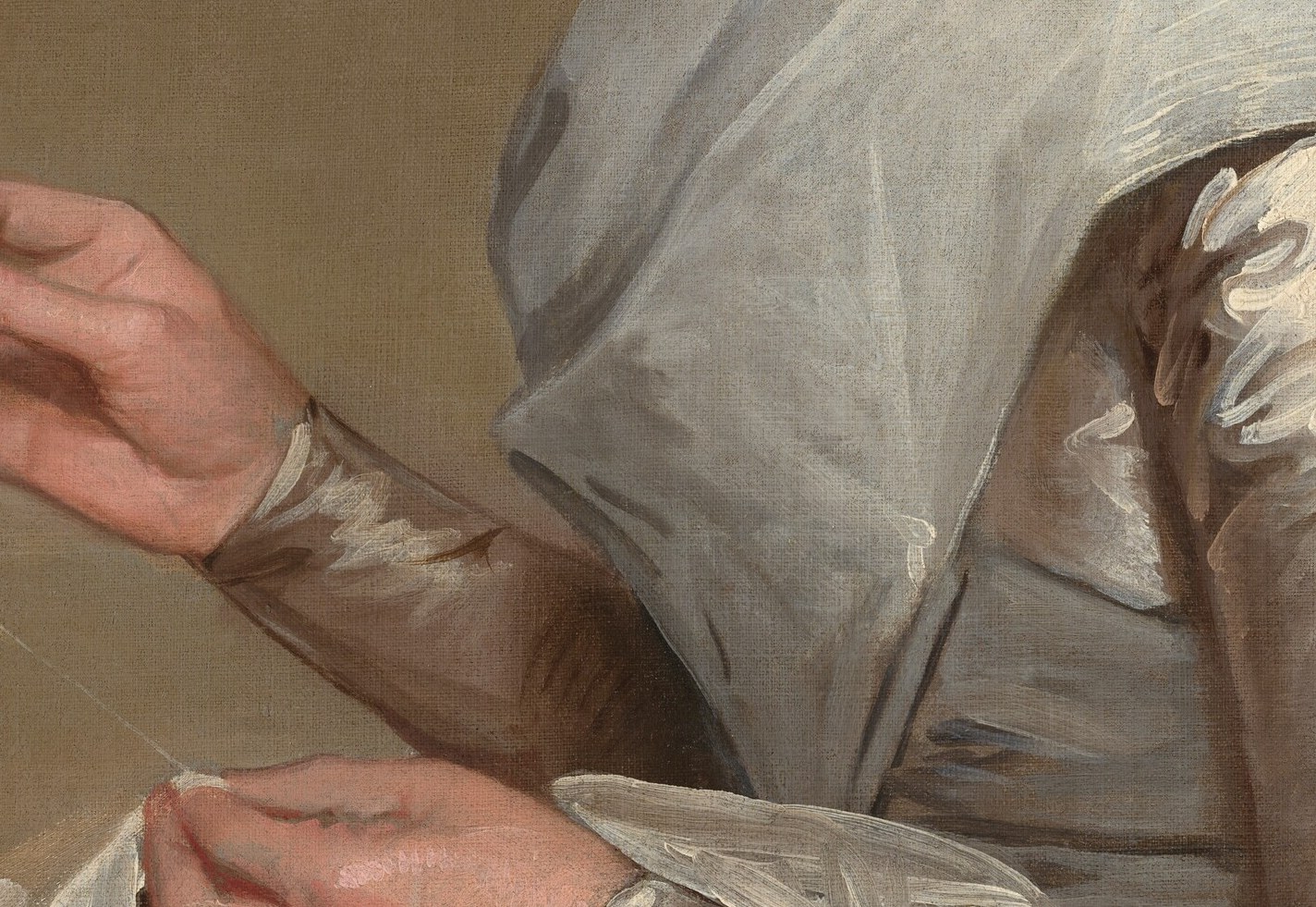 But look at her hands. She is sewing.