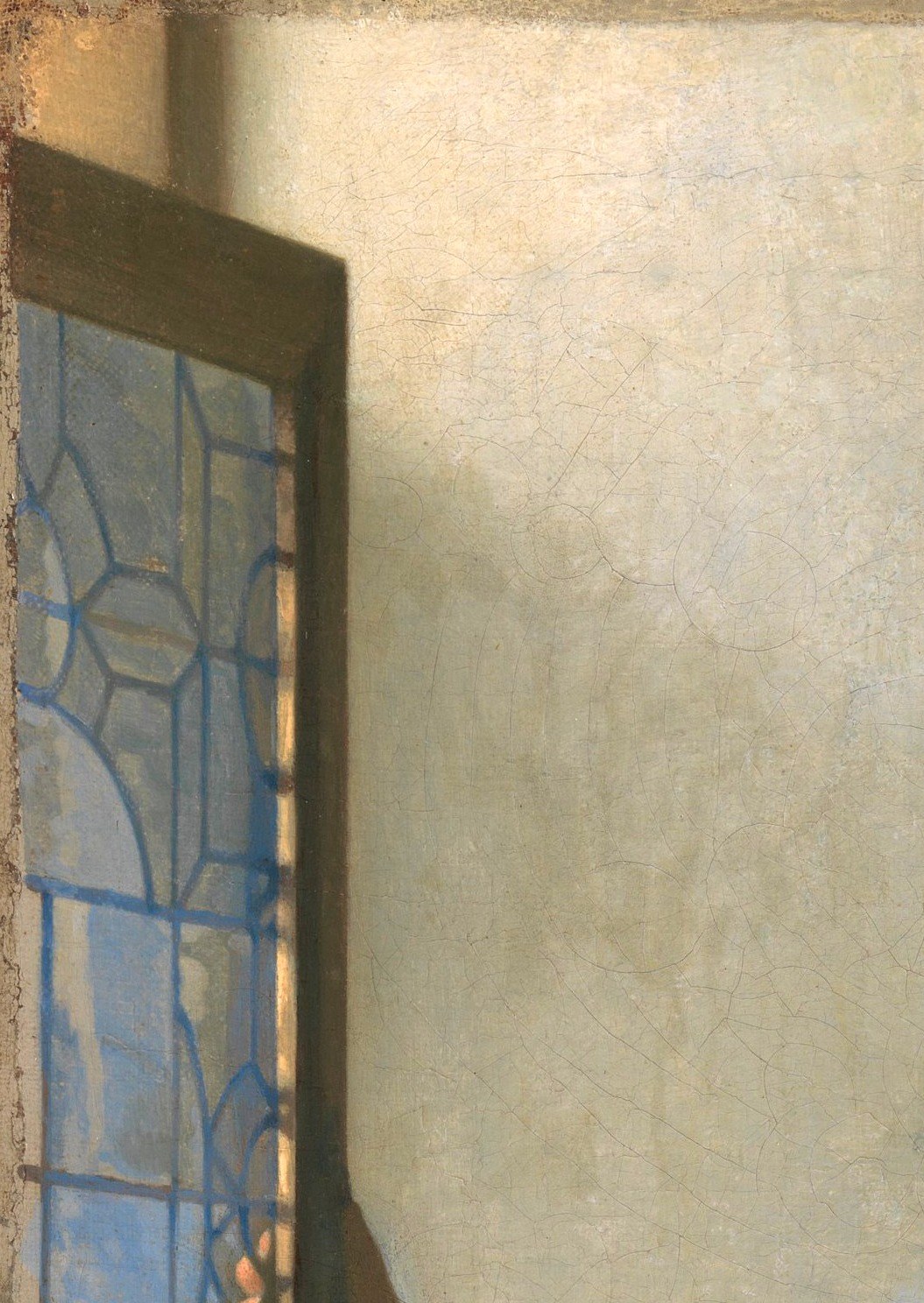 The colored armorial cartouches cast tinted light into the room; close inspection reveals distinct heraldic devices , a detail invisible at normal gallery distance.