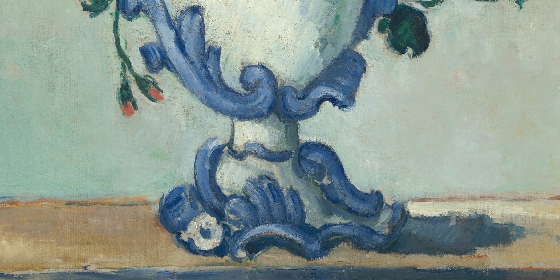 The most intricately painted passage in the lower half; the scrollwork identifies the vase as 18th-century French manufacture, raising questions about where Cézanne found such an object.