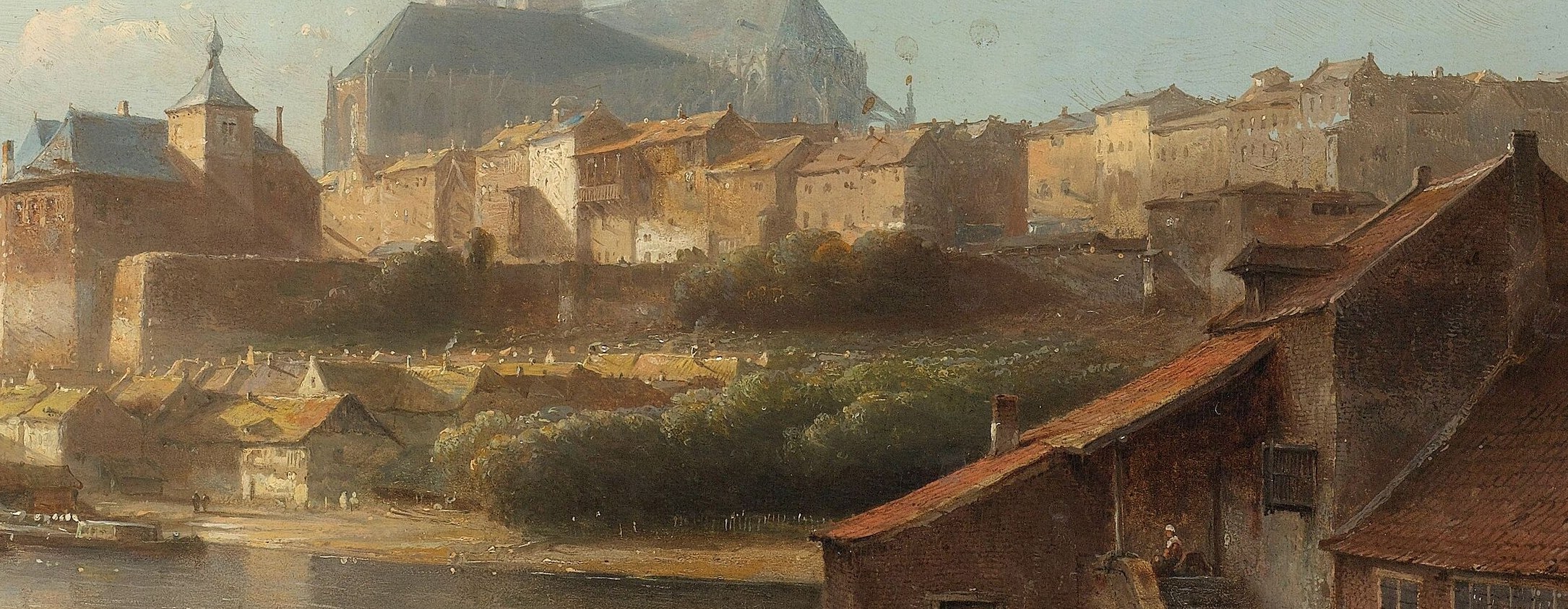 Depicts the urban fabric and architecture, showing the density and style of the settlement.