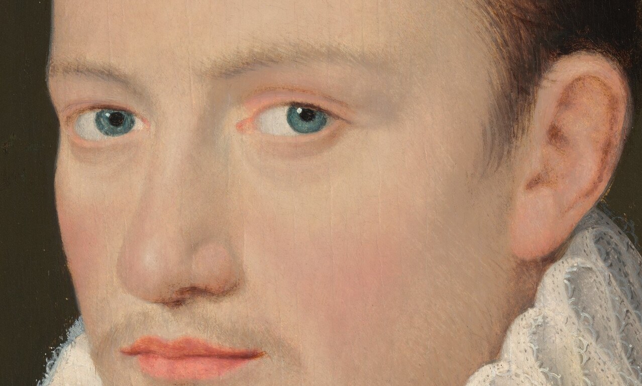Unusually light, almost icy eyes rendered with visible catchlights; the painter has individualized the sitter through an uncommon iris color