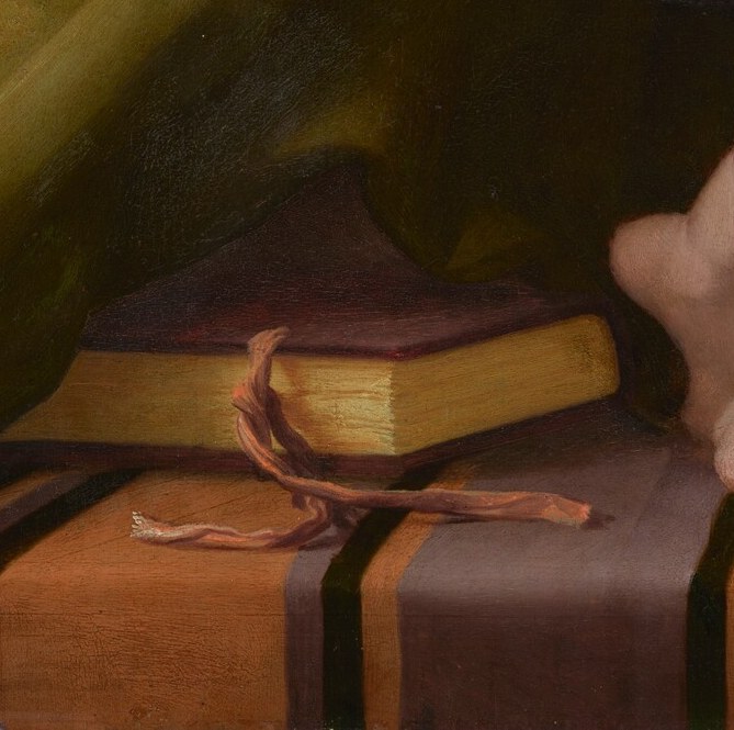 The book on the table suggests sacred knowledge or teachings.