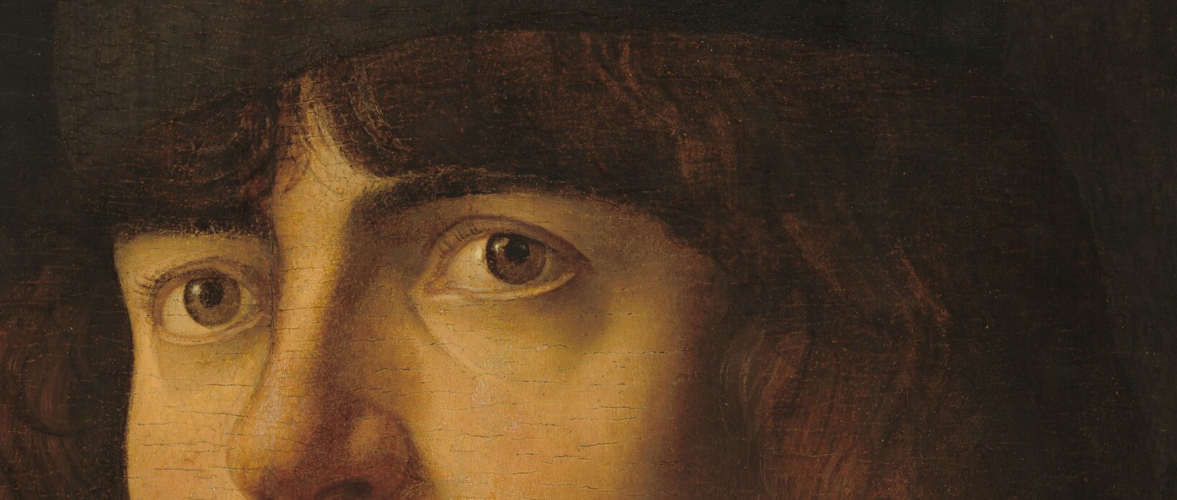 This man looks directly at you.