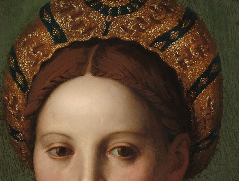 This woman's elaborate headdress signals her high standing.
