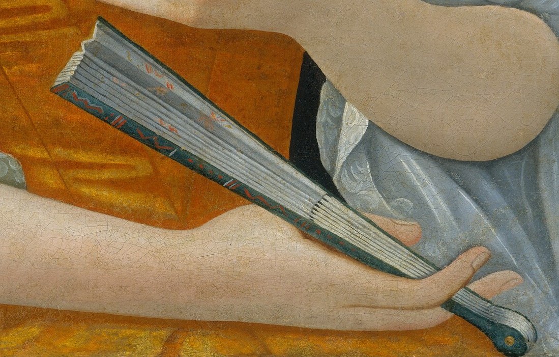 And in her lap, a folded fan suggests discretion.