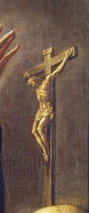 A symbol of Christian faith and redemption, placed prominently on the table.