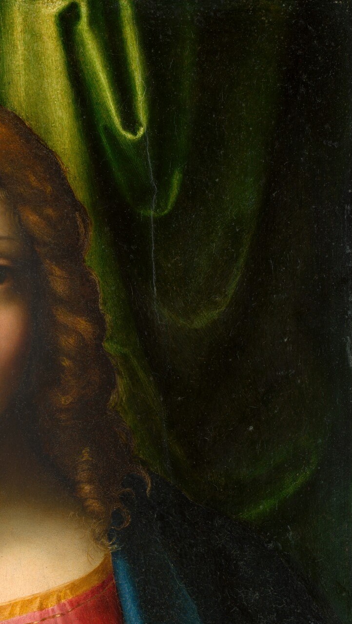 An interior drapery that grounds the sacred figure in a real space; its soft folds demonstrate Correggio's mastery of fabric texture and provide chromatic relief from flesh tones.