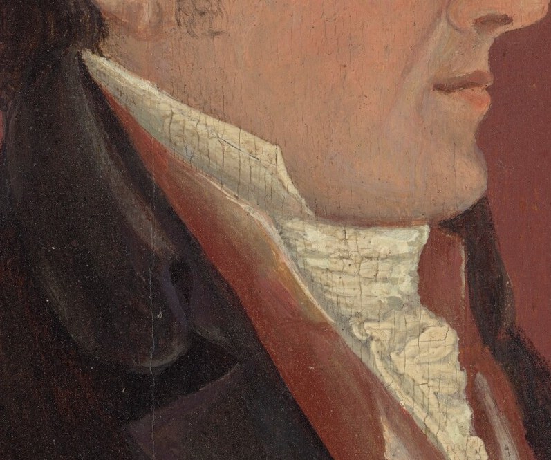 The formal cravat and coat suggest a specific era.