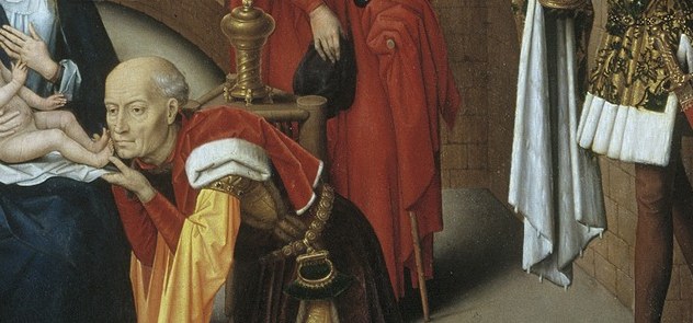 The kneeling Magus offers a precious gift.