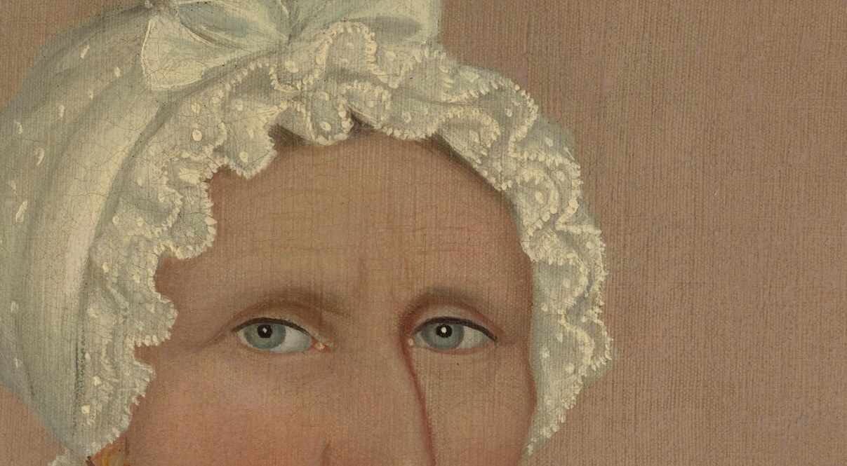 Her steady eyes are the true subject of the portrait.