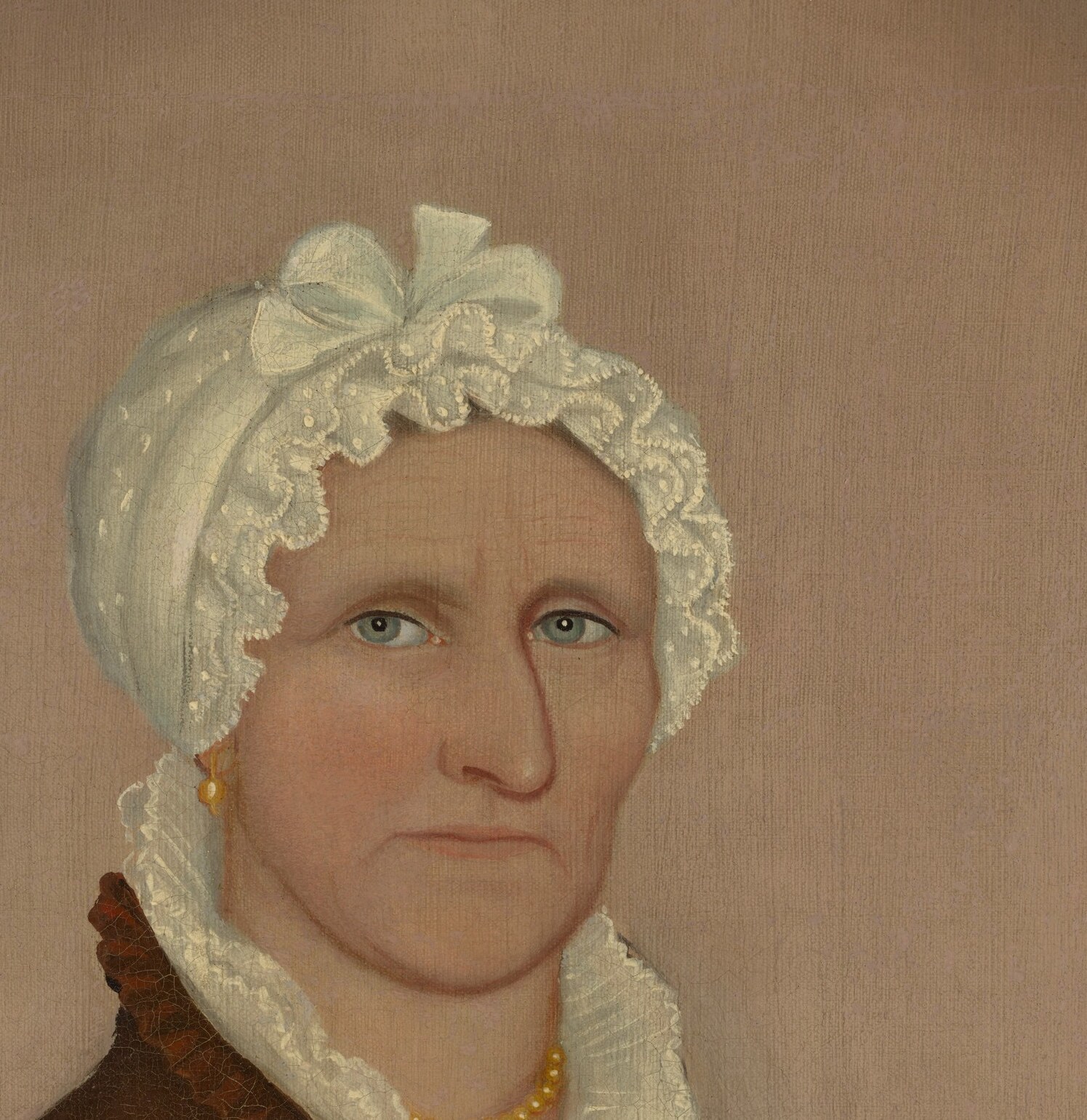 This woman watched the world with an unblinking gaze.