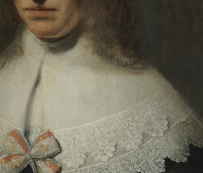 The delicate, detailed rendering of the lace showcases Rembrandt's mastery of texture and light.