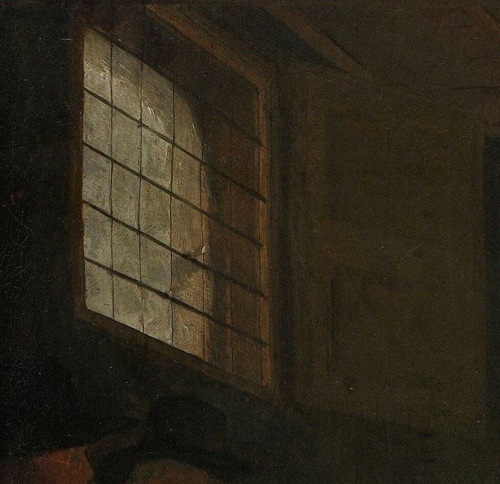 His use of chiaroscuro draws us into this intimate space.