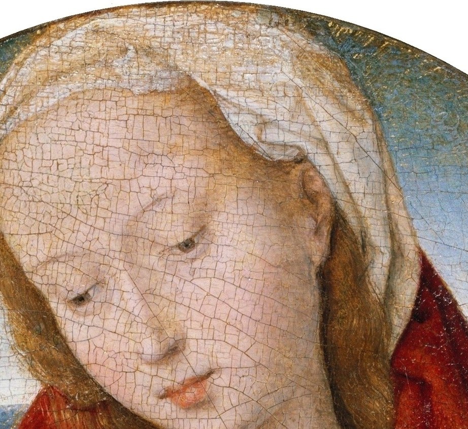 Her downward gaze and gentle, composed features are the emotional anchor of the composition , quiet devotion made visible.
