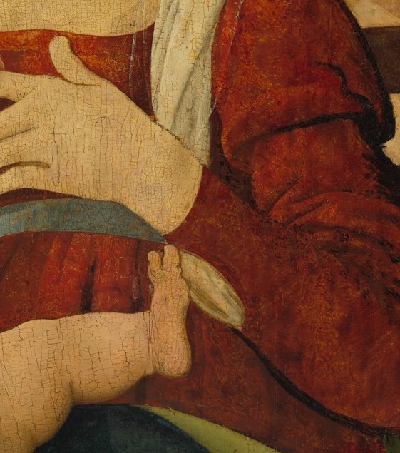 Mary's serene face hides a subtle tension.