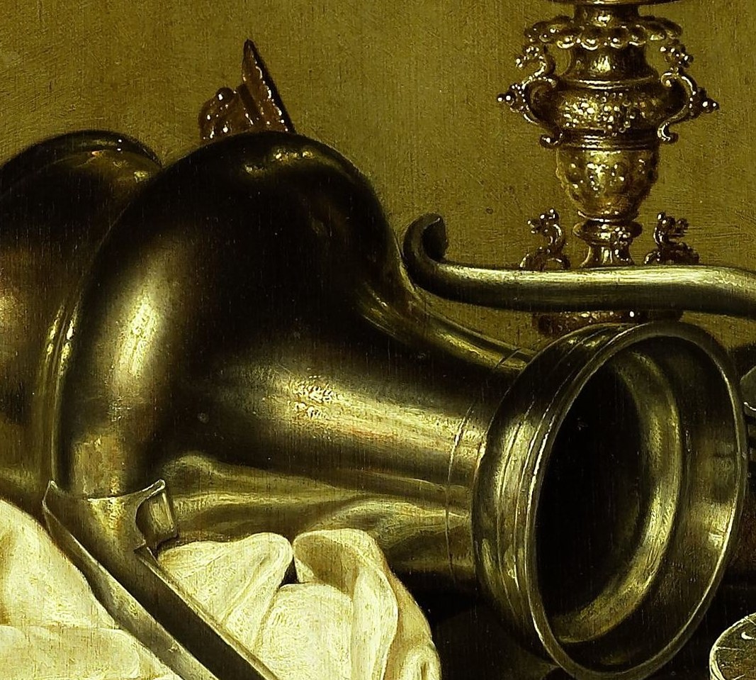 Its metallic sheen and substantial form convey a sense of utility and perhaps a hint of the mundane amidst luxury.