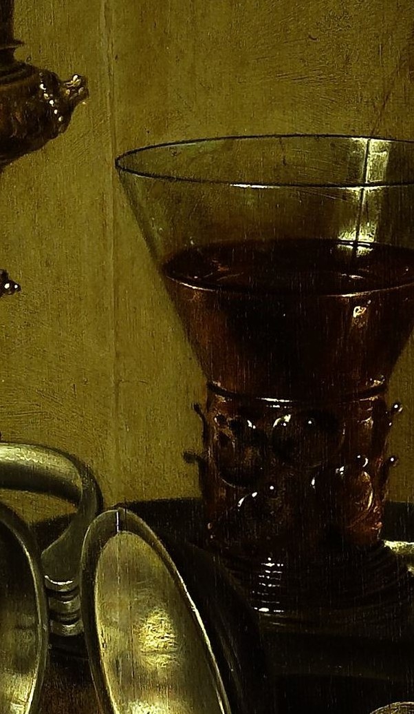 Look at the rich red wine, reflecting light in the glass.
