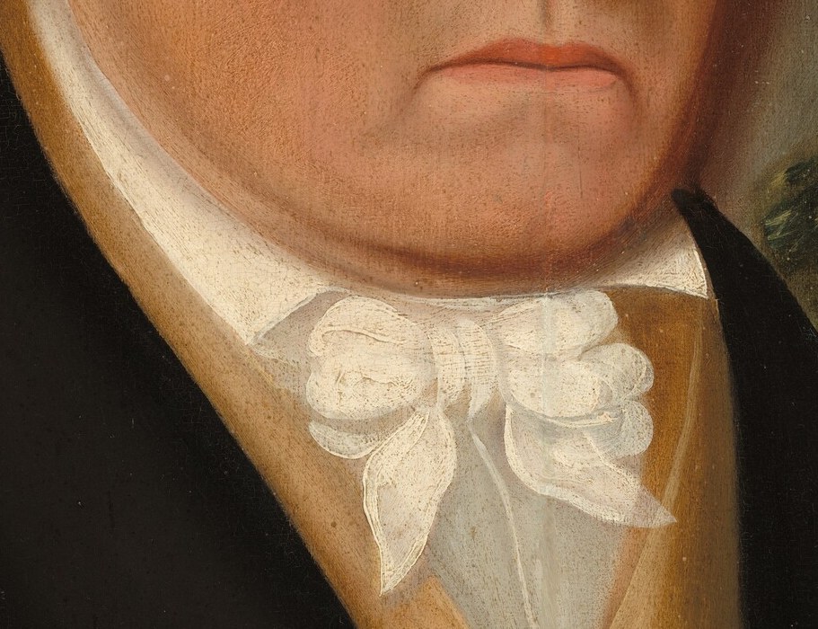 His ruffled cravat shows early 19th century fashion.