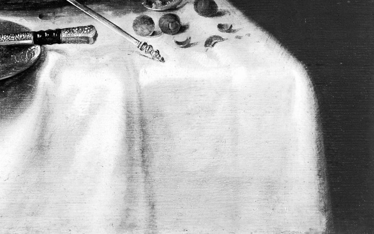 Look at the folds and shadows in the tablecloth.