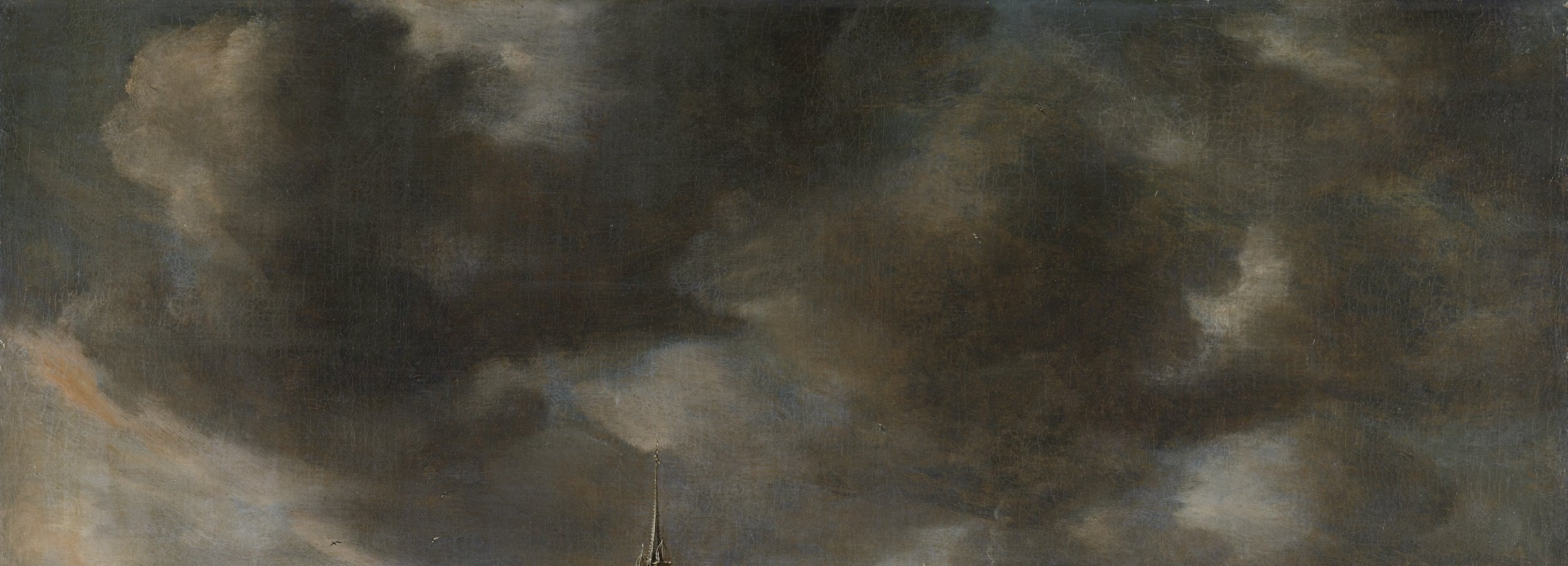 The atmospheric sky with its strong contrasts of light and shadow creates a mood of cold and impending weather.