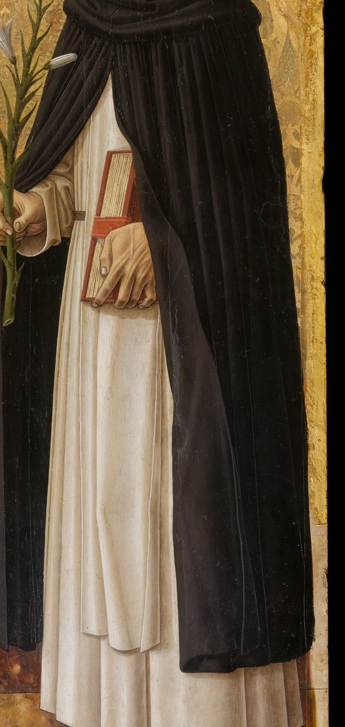 The heavy, dark fabric creates a somber mood and emphasizes the saint's asceticism and religious order.