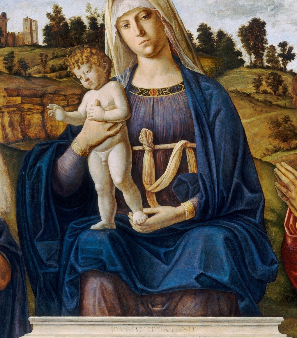 Lapis lazuli blue, the most expensive pigment of the era, reserved for the Virgin by convention; the sheer mass and richness of the color signals divine status as much as any halo.