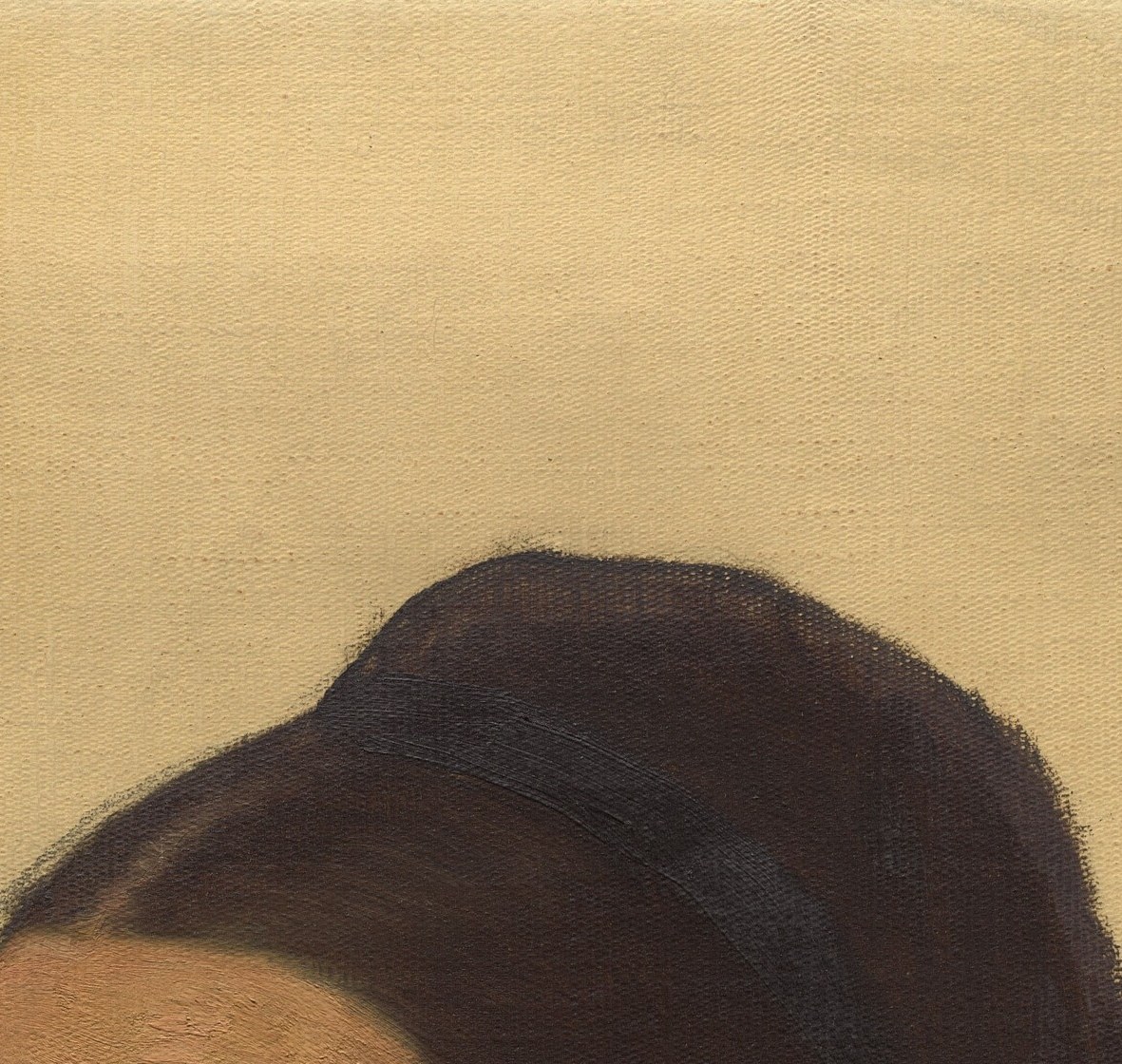 Her tight chignon and plain dress were the fashion of her time.
