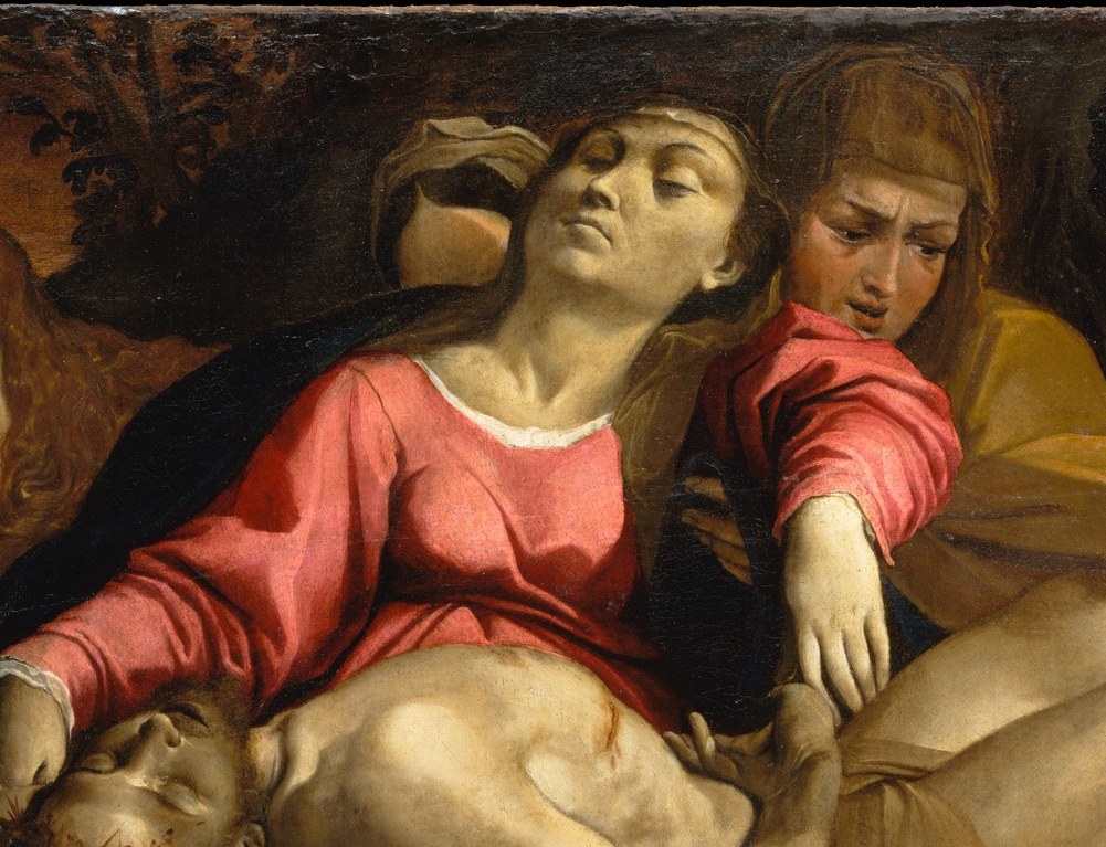 The saturated red garment , most likely Mary Magdalene , acts as a chromatic anchor; the figure's deep forward incline channels grief downward like an arrow pointing at Christ.