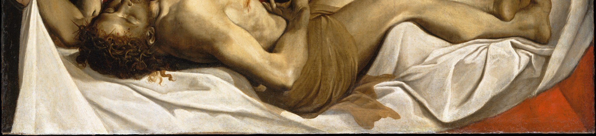 The brightest passage in the painting and a symbol of the coming Resurrection; its crumpled, cascading folds are a virtuoso drapery passage , Carracci using theology as a pretext for technical display.