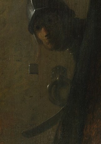 A soldier waits for the moment.