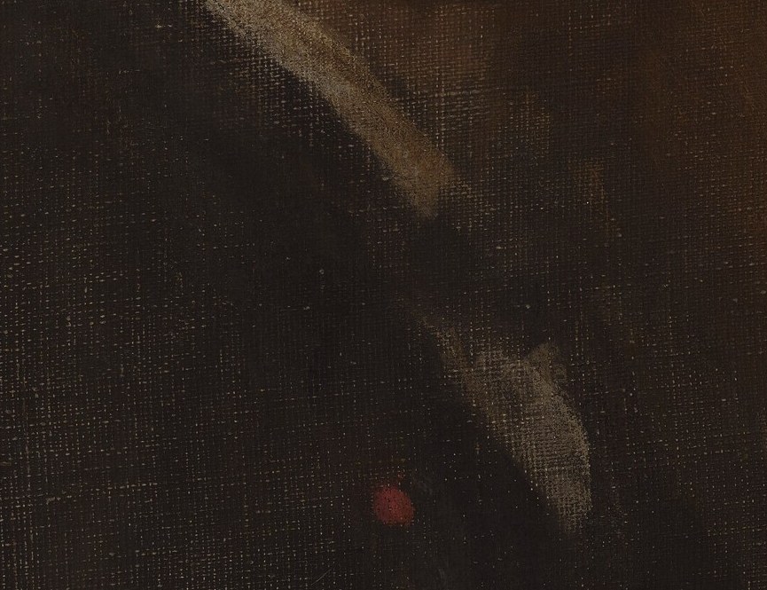 The single bright note is his cravat. A pivot between face and void.