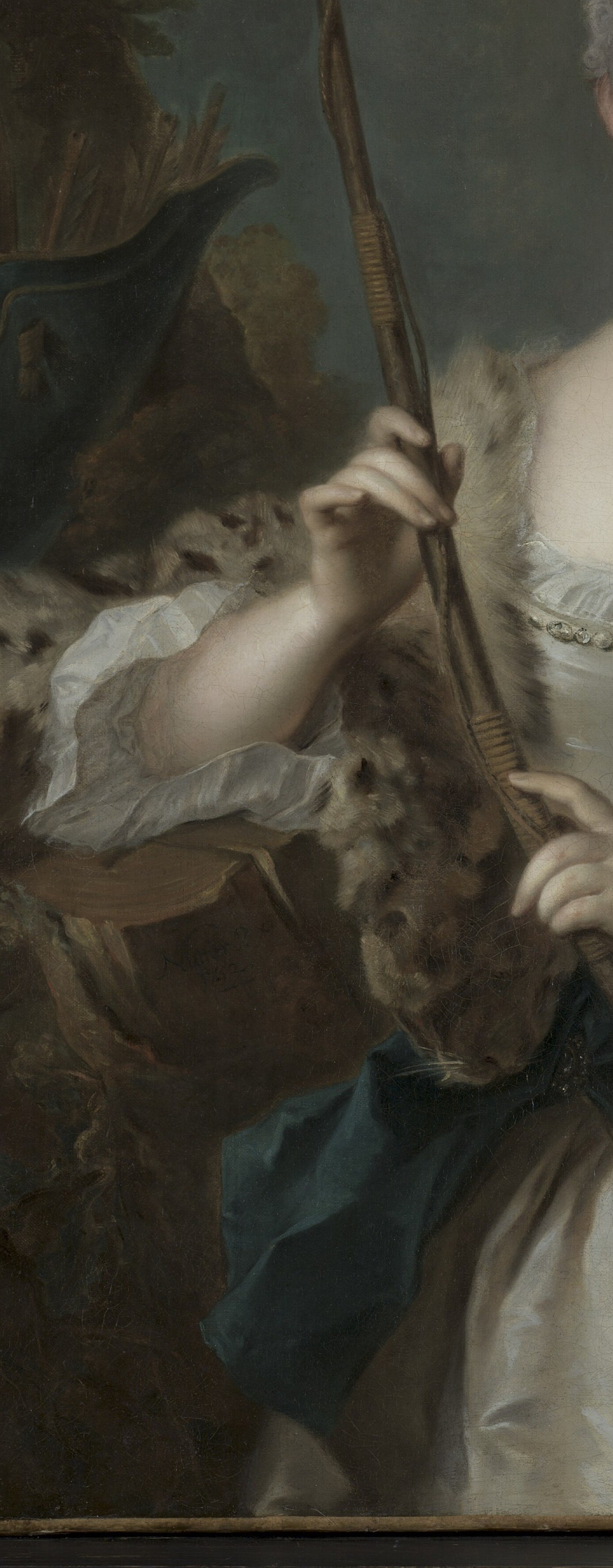 She is the Roman goddess Diana, goddess of the hunt.