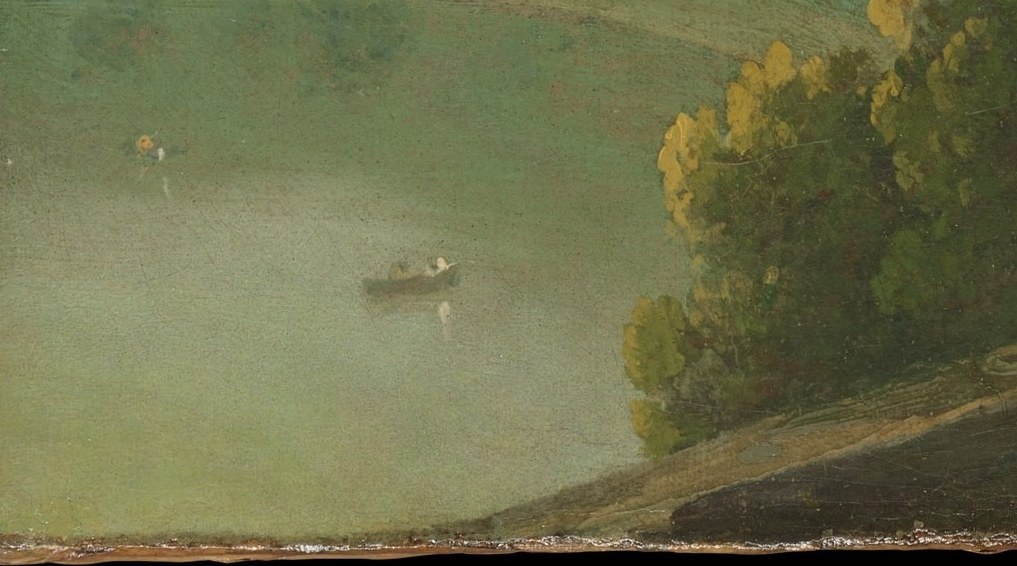 The calm Lake Nemi reflects the golden light beautifully.