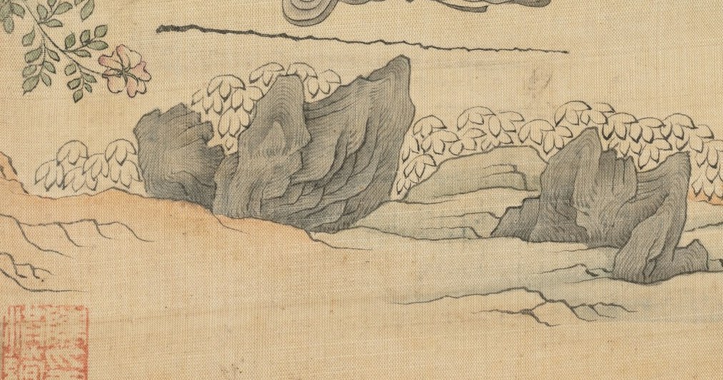 The textured rocks add a sense of groundedness and natural beauty to the scene.