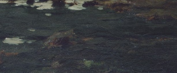 Water reflects the muted, overcast sky.