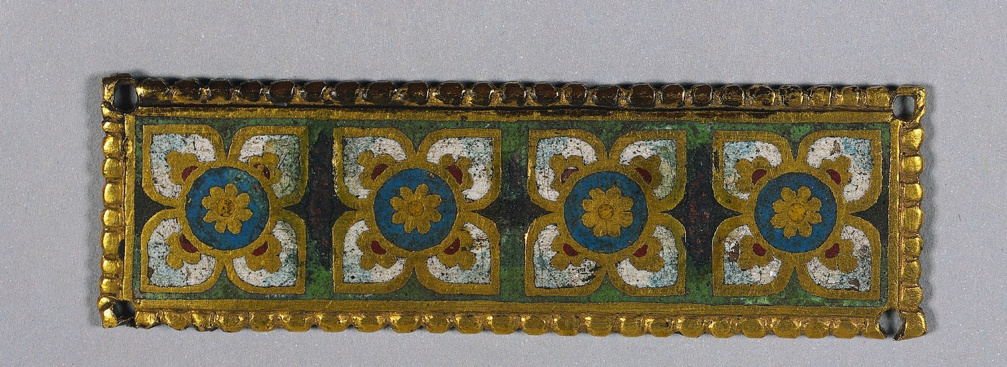 The vivid blue-green ground is technically demanding vitreous enamel; its color against the gold is the dominant chromatic statement and evokes celestial space in Byzantine tradition.