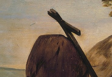 She holds the cross.