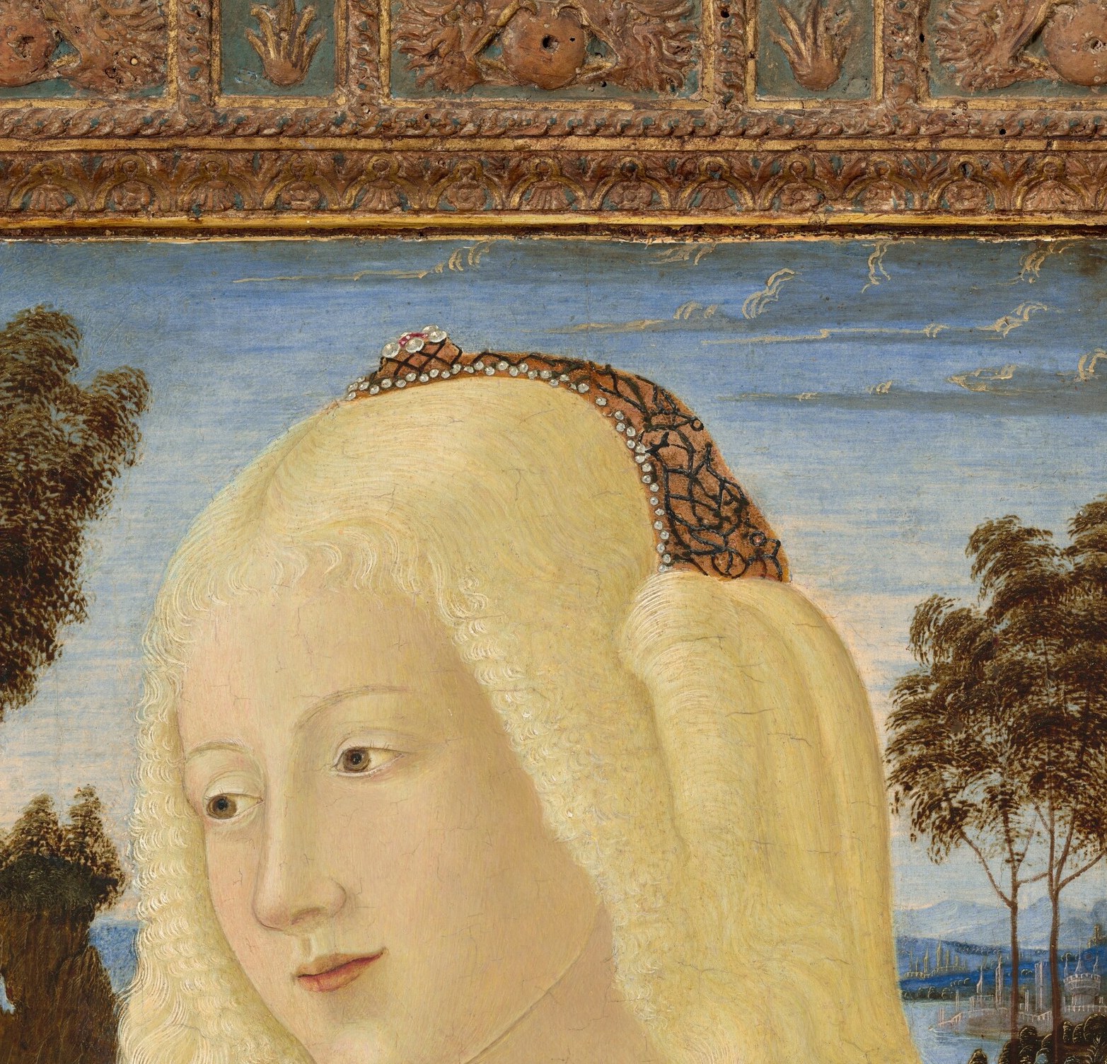 Her serene expression is a hallmark of the painter's style.