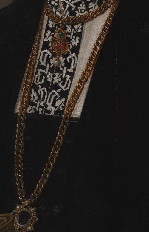 The gold chain suggests wealth and high status.