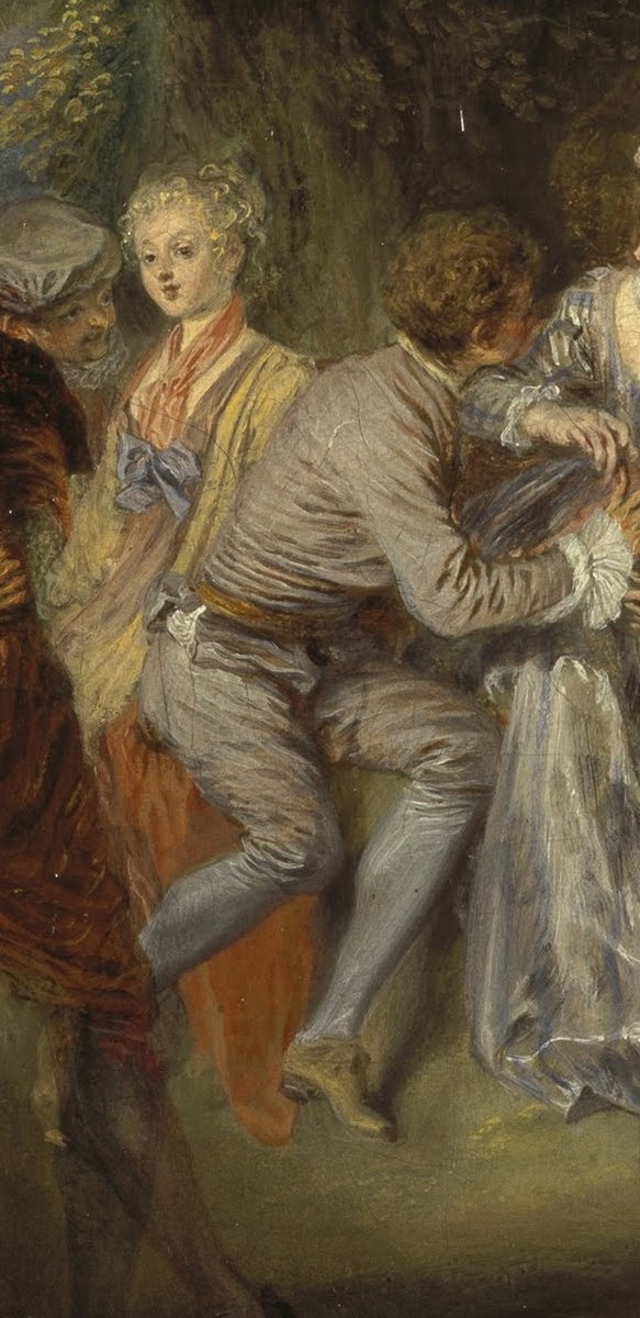His direct gaze and slightly tilted head suggest engagement and perhaps a playful interaction with the central dancer.