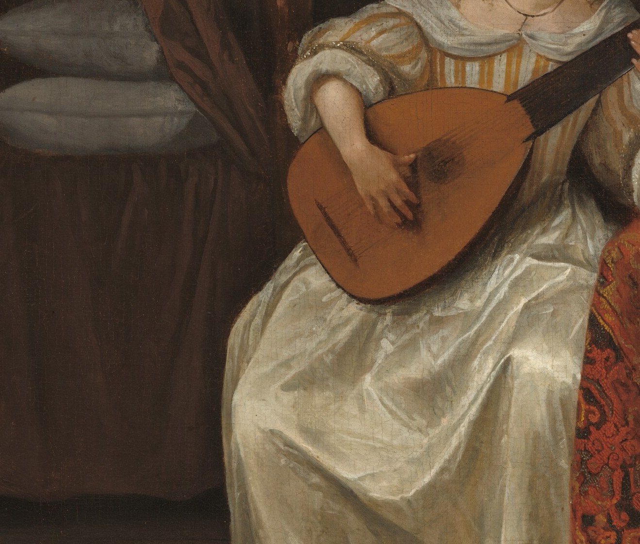 Her fingers shape the chord. His hand inches closer.