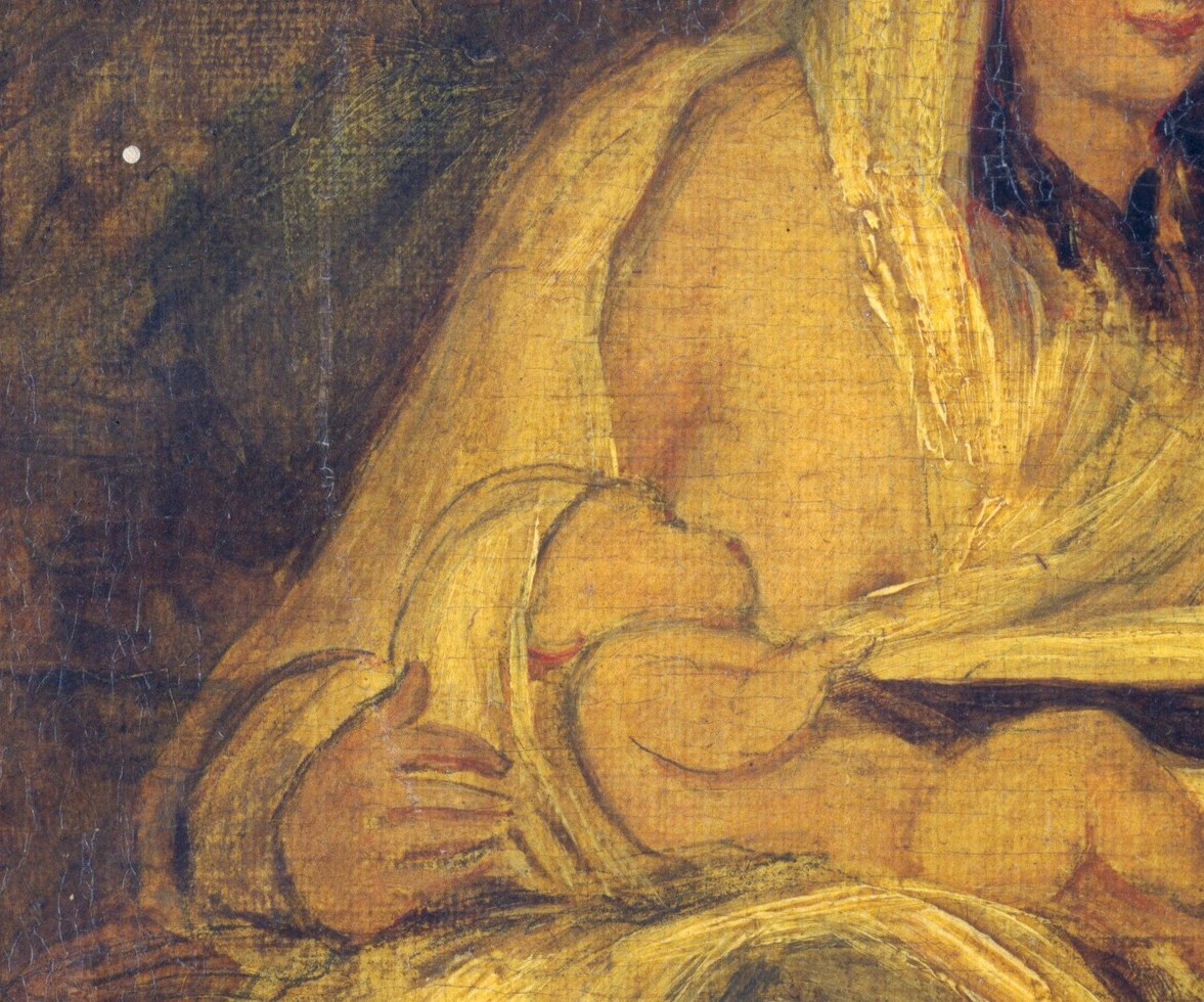 Mary gently cradles the open book, the Word made flesh.