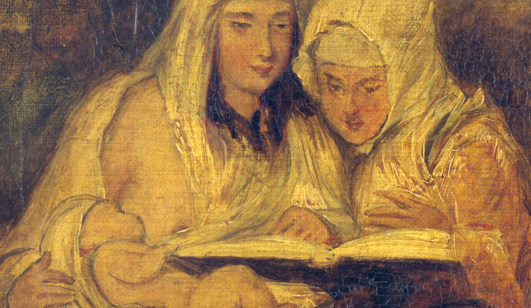 The women share an open scripture, their bond through faith.