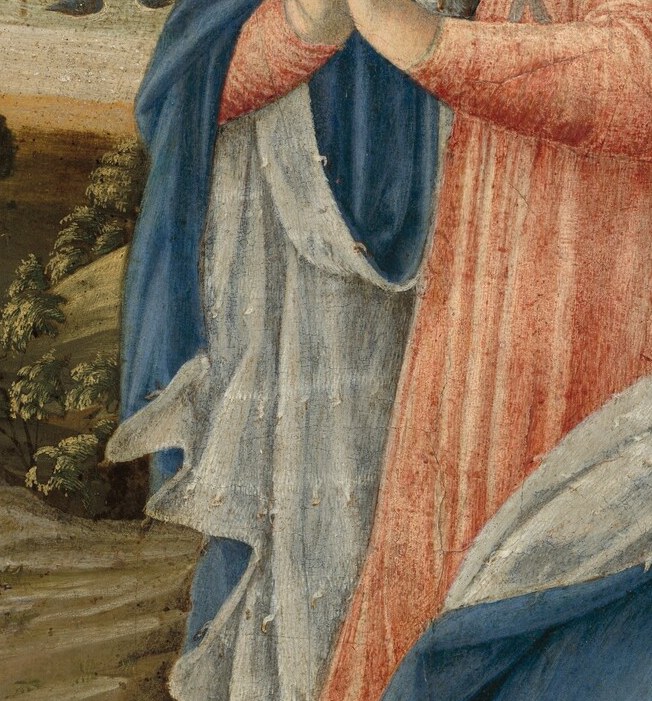 Her clasped hands show adoration for the divine.