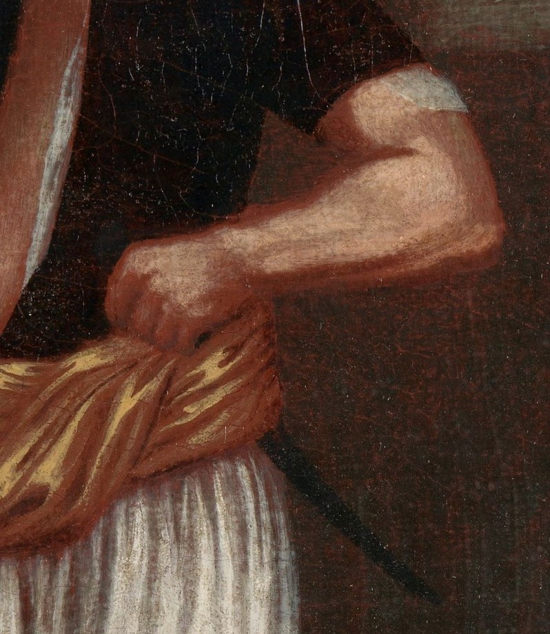 His right arm. Muscle and vein, visible.