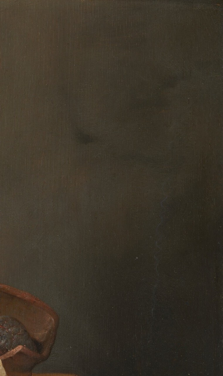 The subtle darkening from upper-left to lower-right is the unsung structural element that makes the pale jug glow; close inspection may reveal a shelf edge or shallow niche recess hidden in the tone.