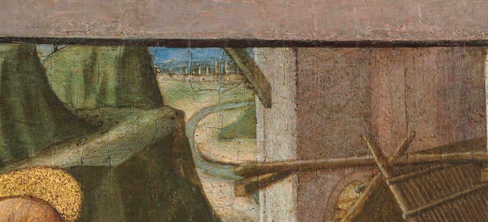 Now look at the angel's scroll. Scholars have debated it for centuries.